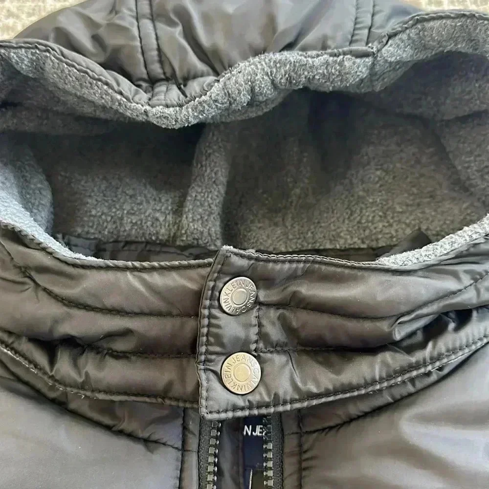 Calvin Klein Jeans boys fleece lined puffer jacket with hoodie blue/black size 4